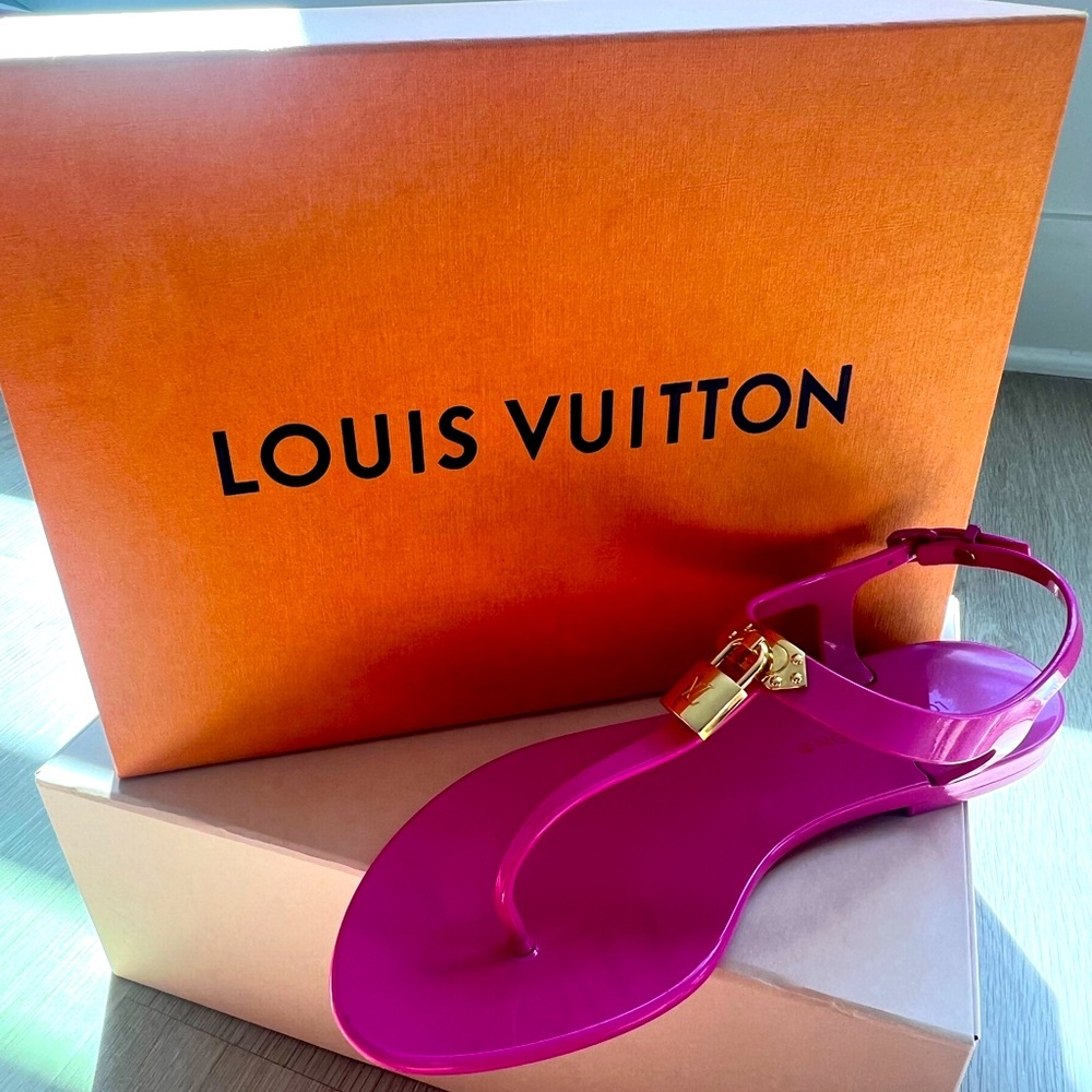 Louis Vuitton Women's Pink Jelly Thong Sandals with Gold Padlock Accent